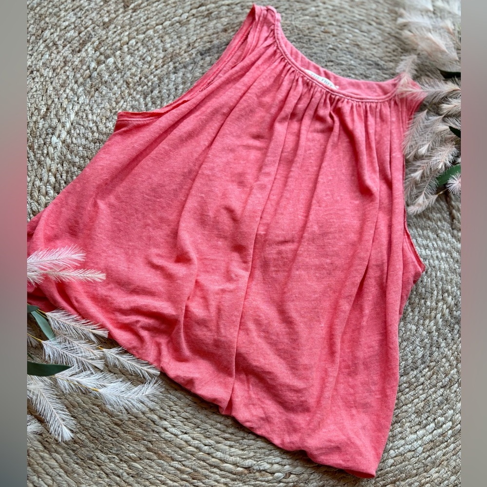 Stand out in style with this Free People Neon Flowy Tank—vibrant and comfy!